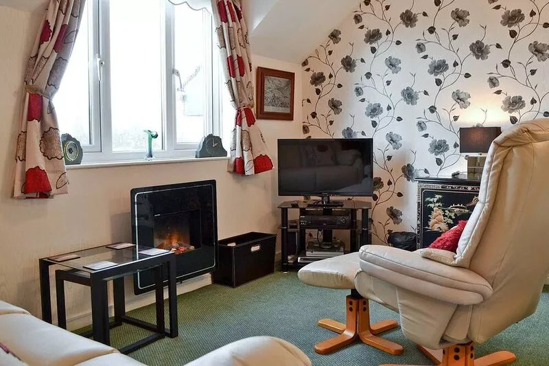 A second floor apartment in the heart of Bowness with views across the lake