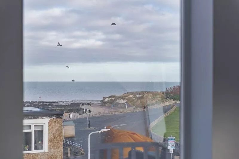 Stunning townhouse with sea views and parking, a short walk to the beach