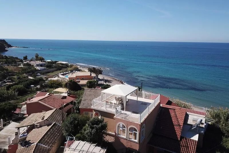 Holiday apartment directly at the sea, large terrace, 5 persons | Paramonas, Kor