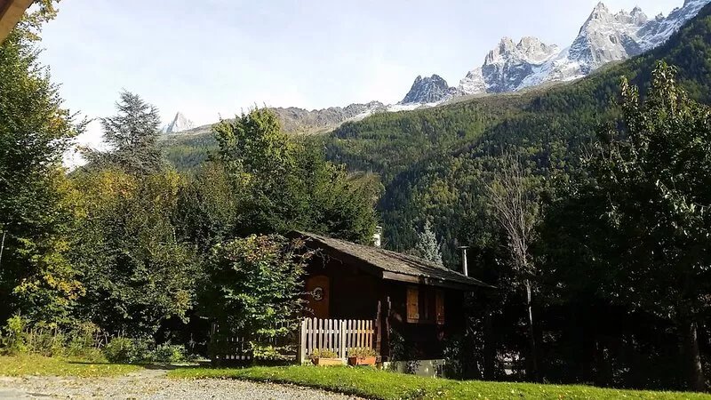 Cosy Alpine chalet for two with log fire in peacefull gardens.