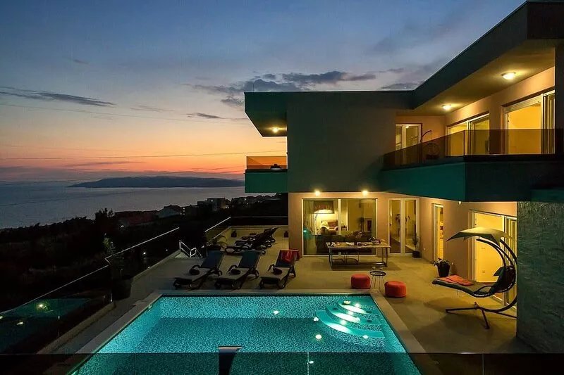 Top Features! Holiday house with heated pool with sea view, for 10 people