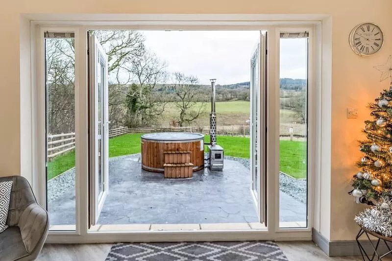 Enjoy the peace and tranquillity of the countryside while relaxing in the hot