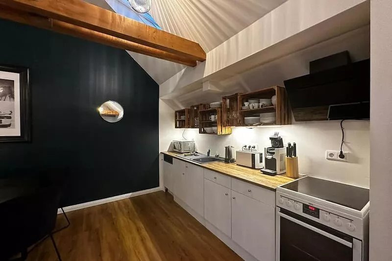 This cozy duplex apartment offers everything you need for a comfortable stay.