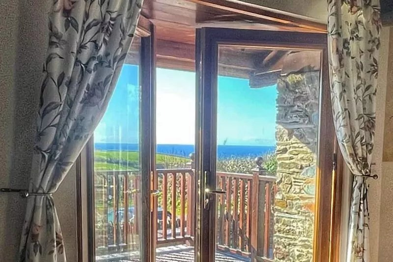 The Old Wagon House, views over the fields and sea