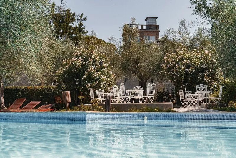 On the ground floor of an old farmhouse, in the countryside with a swimming pool