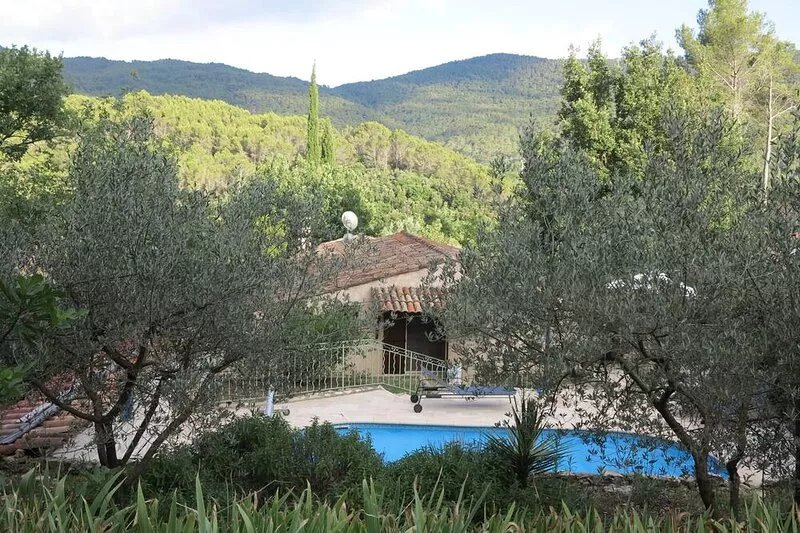 House with outdoor pool in a beautiful setting