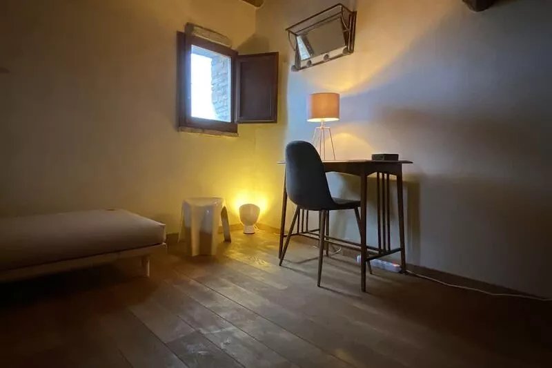 Charming apartment in the medieval village Montelagello with garden and pool