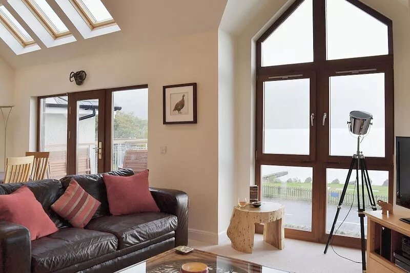 Enjoy this superb lochside property, with access to a shingle beach with