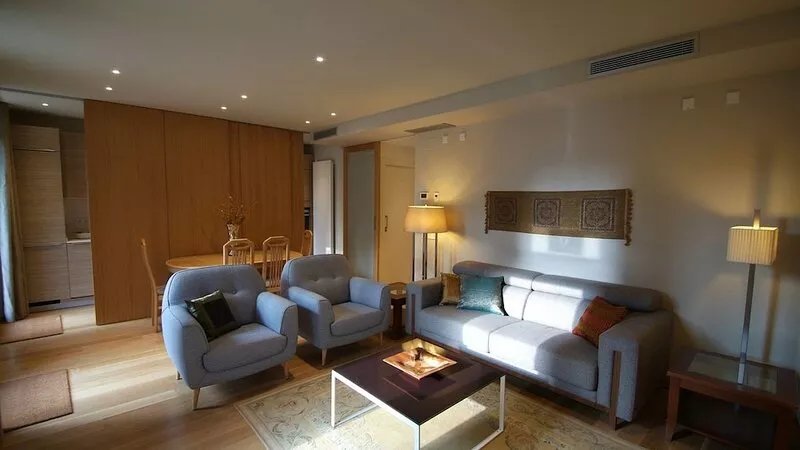Beautifully furnished luxury one bedroom apartment with a small garden and pool