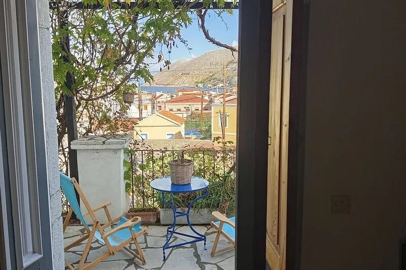Pretty village house with very nice view over Symi harbour from large terraces.