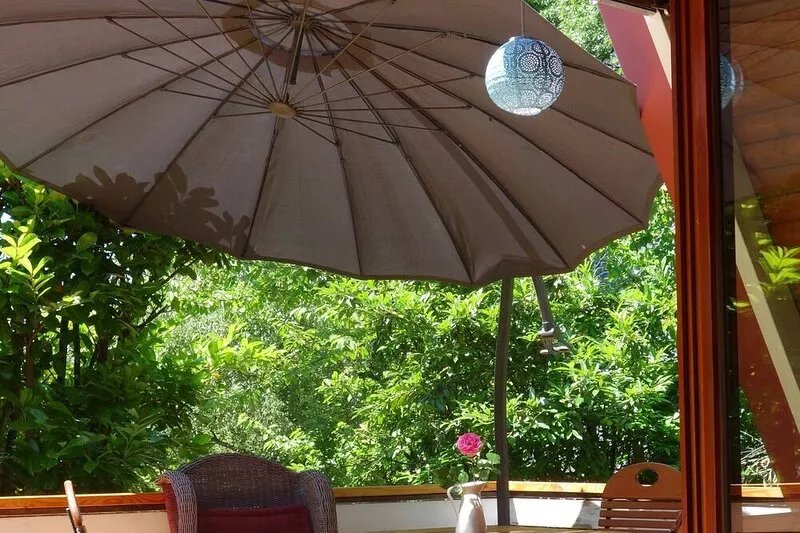 Idyllic and quietly situated wooden house / cottage in a large garden in the