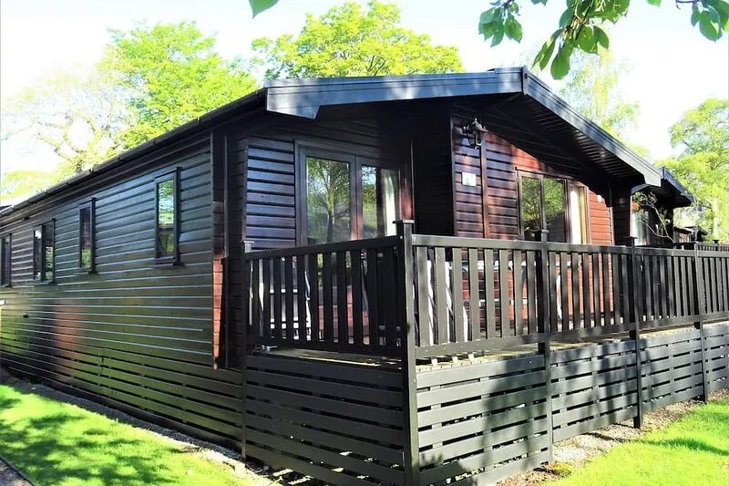 Luxury pine log cabin situated in landscaped gounds with panoramic views of the