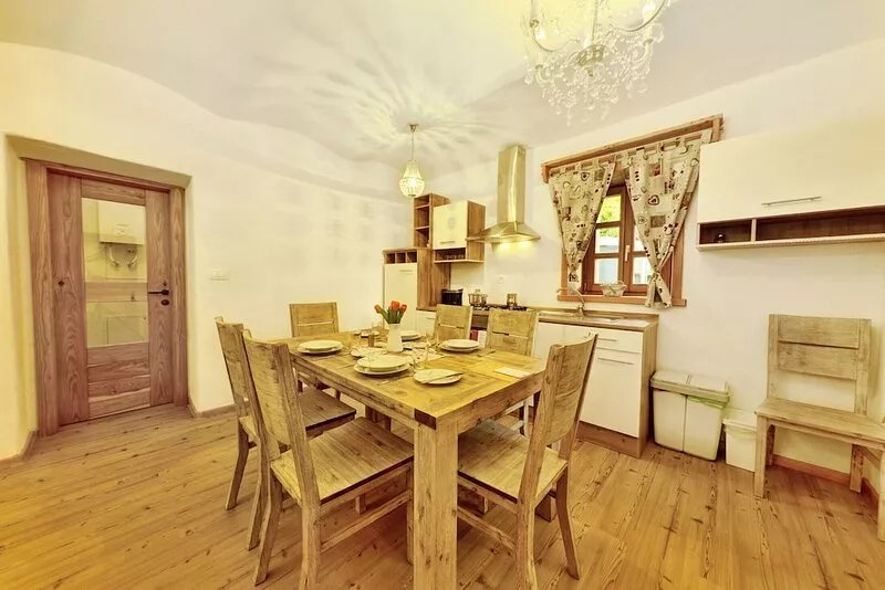 Apartment Planica 3 with a garden & a hot tub