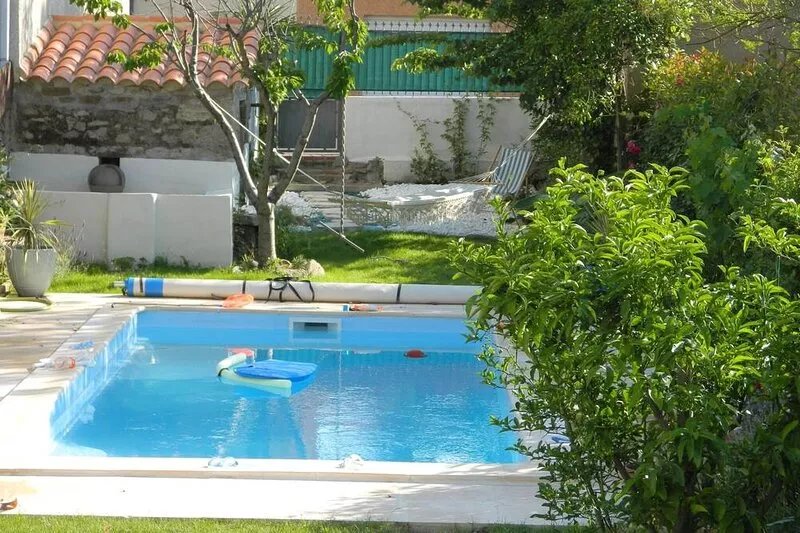 Pretty village house with private heated pool. Opposite historic church.