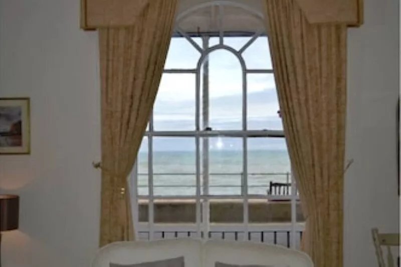 Sidmouth seafront apartment, just yards from beach,  tastefully furnished.
