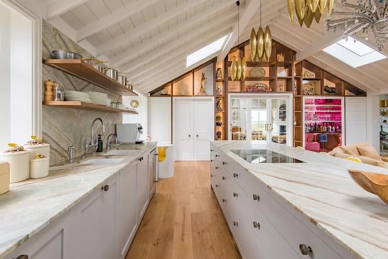 A luxurious waters-edge holiday home by the sea sleeping 11 right on the beach