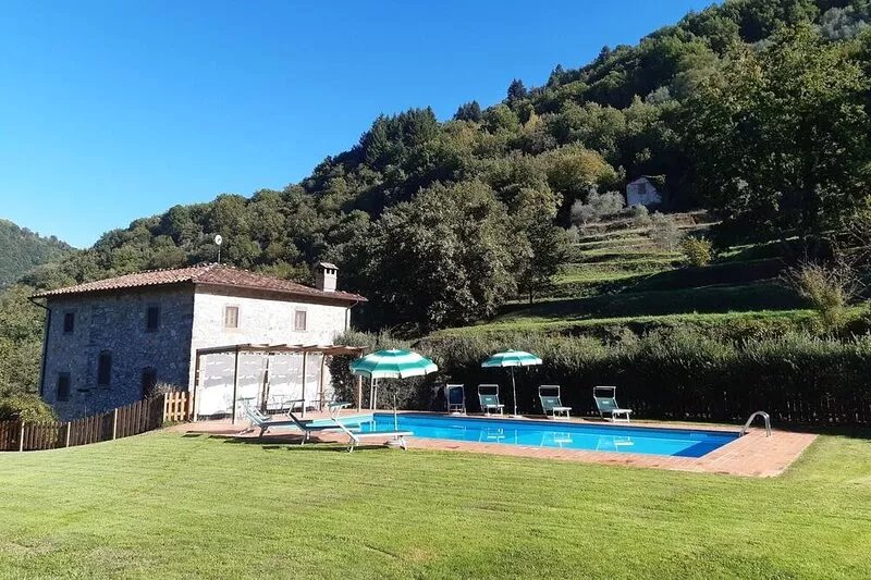 Very large house, surrounded by green, sunny, whit a private pool.
