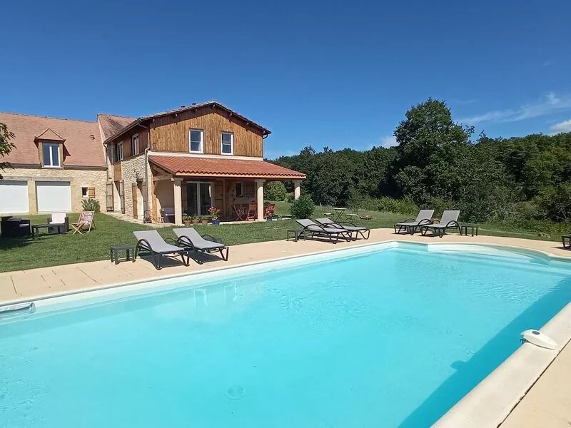 Newly rebuilt family home (July 2010) on 2 ha of land.