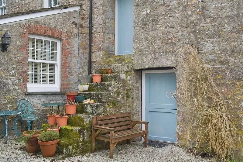 Overlooking Siblyback Dam and open countryside with a footpath leading to a