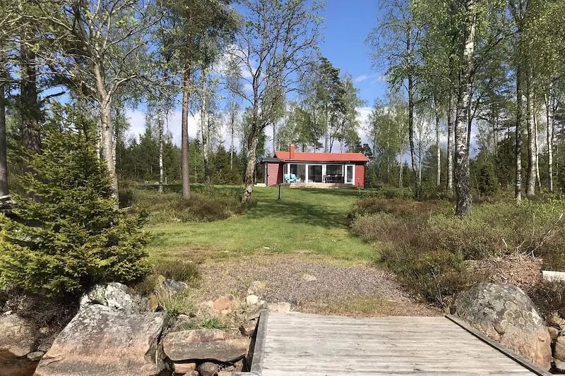 Winter garden and living room with view on the lake, 2 bedrooms.