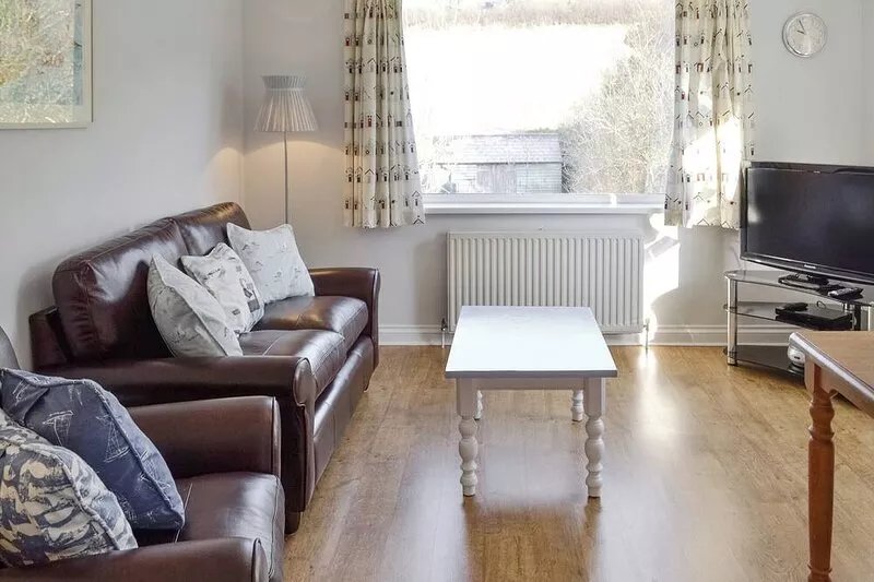First floor accommodation boasting a 5ft wide four poster bed and views over