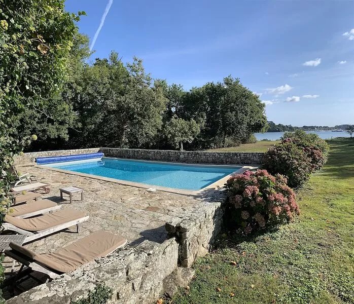 Waterfront manor house with heated pool