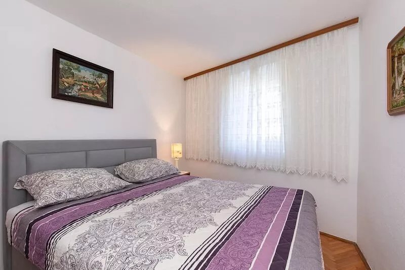 Two bedroom apartment with air-conditioning Baška, Krk (A-19517-a)