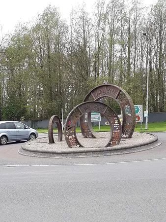 The Three Coins Sculpture