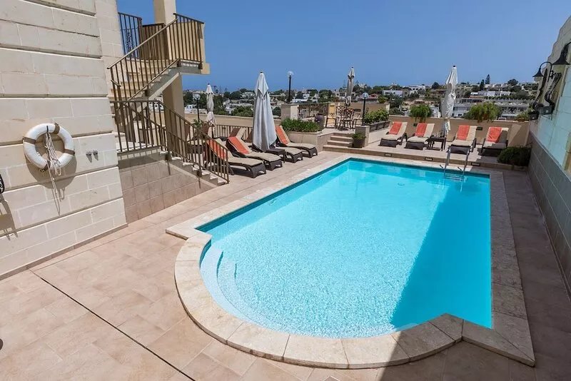 Villa Margherita Unit 1, with a large Pool, patio, and spacious outside spaces.