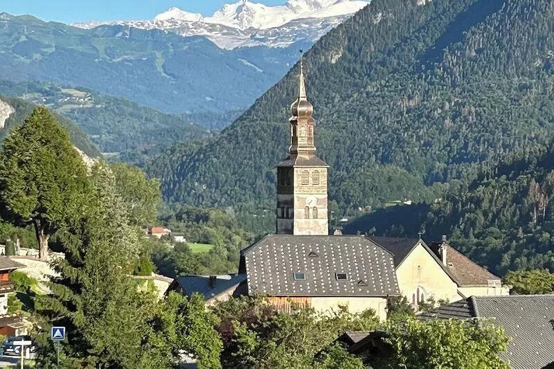 Mountain chalet with pool & stunning views, close to skiing & summer activities.