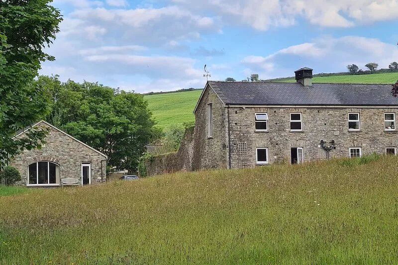 Riverside retreat with rustic charm and a history of novels and exploration