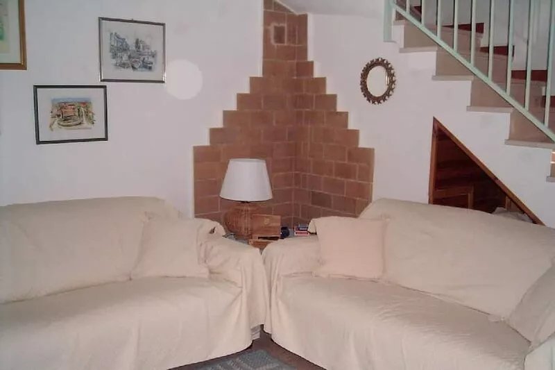 Nice house a walking distance from the sea. Small terraced villa with 3 bedrooms