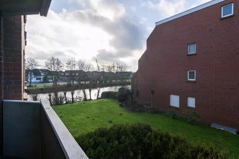 Cozy upper apartment Nordseebrise with a view of the canal