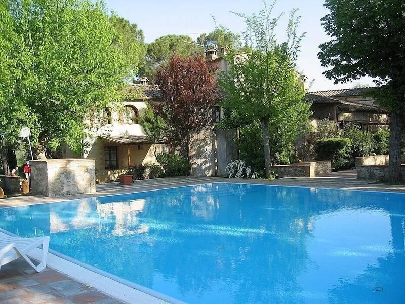 Villa Saveria L: A characteristic apartment surrounded by the greenery.