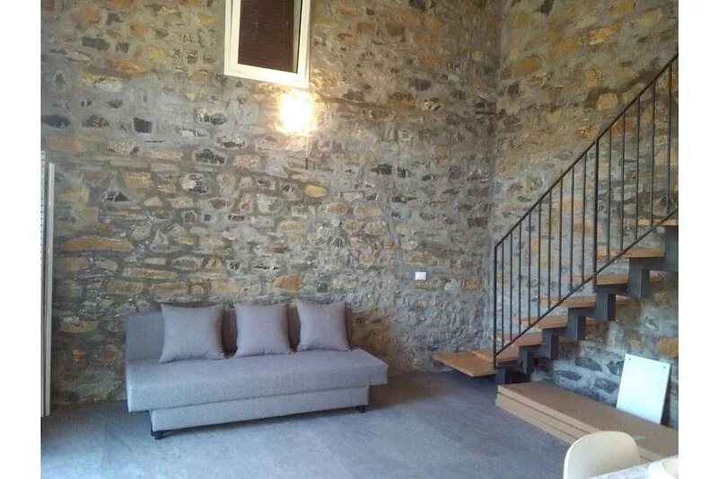Just renovated apartment with stone interior walls.