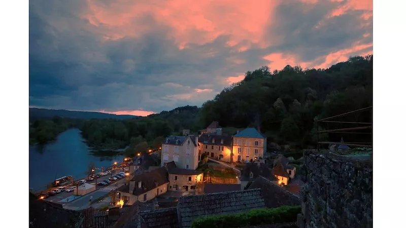 In the heart of Beynac, a  rare14th century house