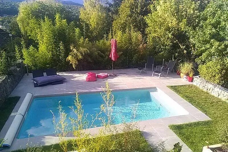 house with beautiful pool jacuzzi sauna benefits