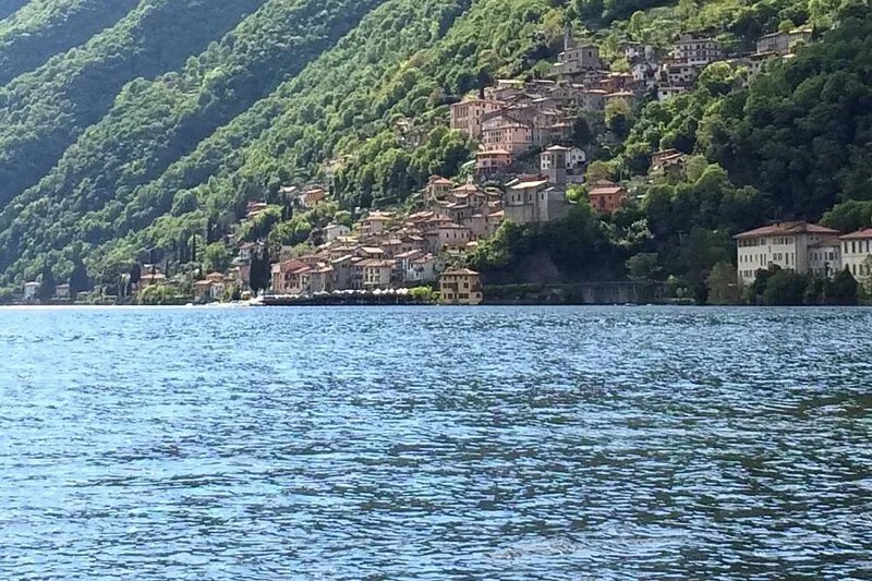 Detached village house with garden and views of the lake and mountains. Near