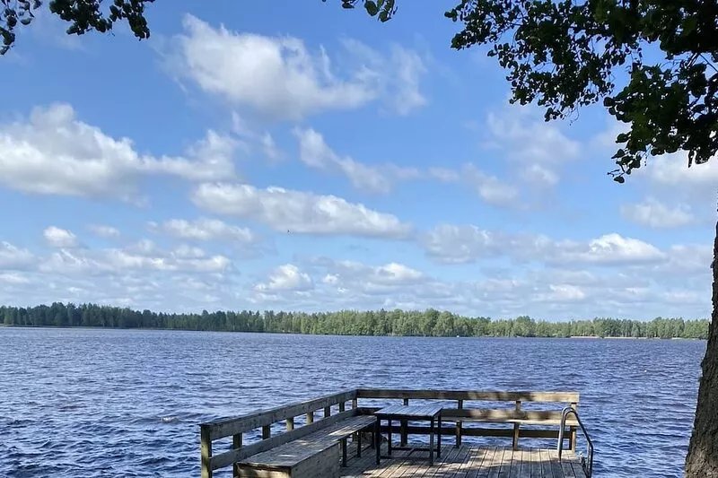 Traditional Swedish wooden house by Lake Torsjön