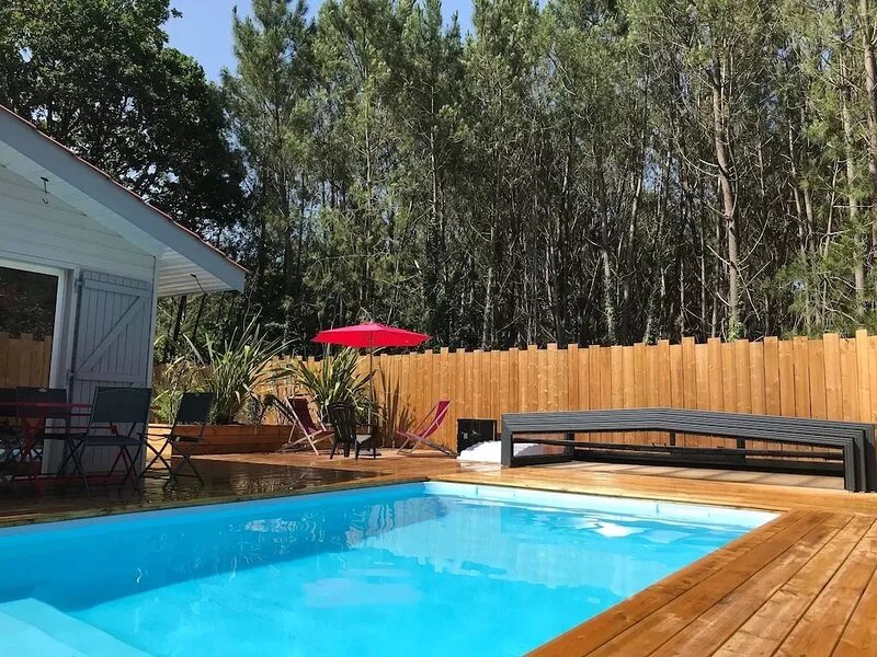 Near Soulac/mer 50M² air-conditioned chalet with private heated indoor pool