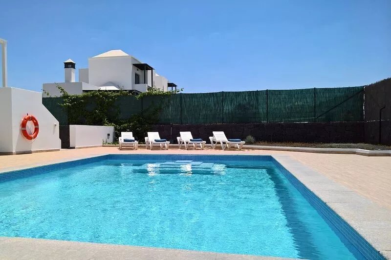Fantastic 2 bed  2 bath villa with heated pool near town center.