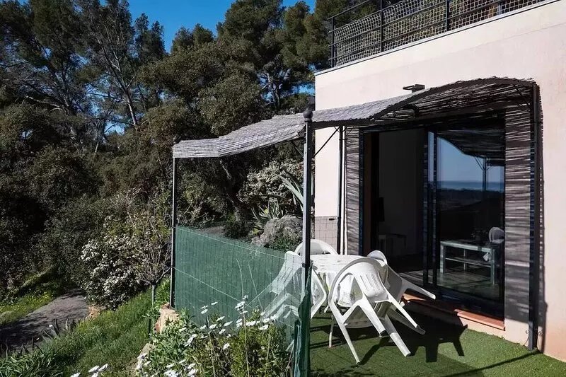 Garden level with sea view.