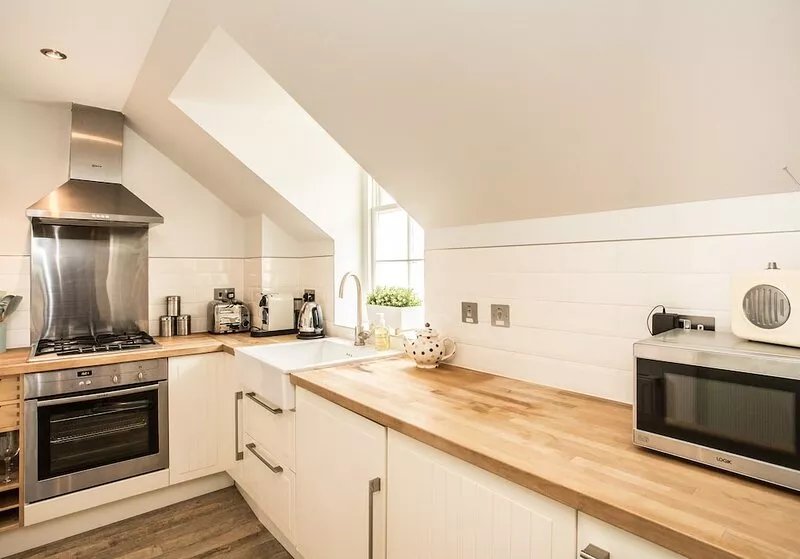 Stylish first-floor apartment with private patio, just moments from the High
