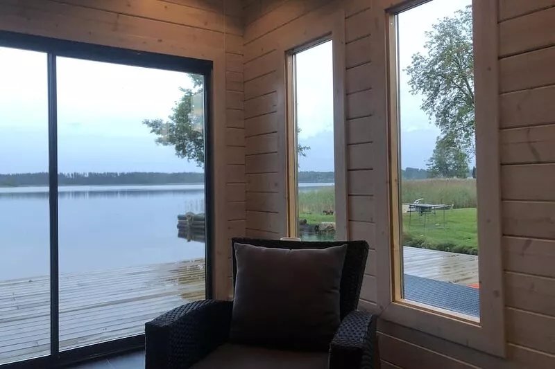 Holiday home Sweden by the lake bolmen with sauna, fireplace and boat