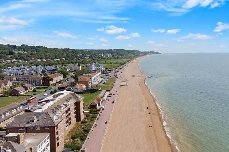 Garden apartment with parking seconds from beach!