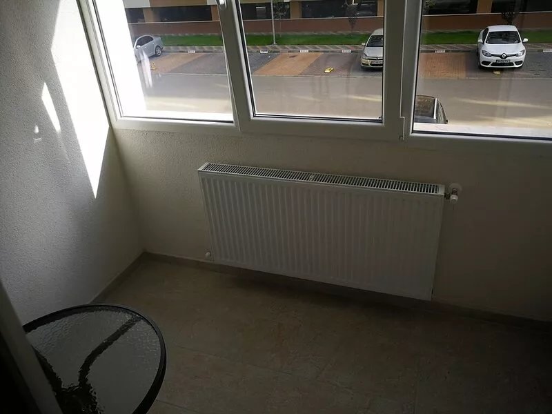 The apartment is placed in a condominium located in a residential complex.