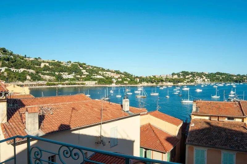 26. A colorful apartment with a beautiful sea view and a balcony