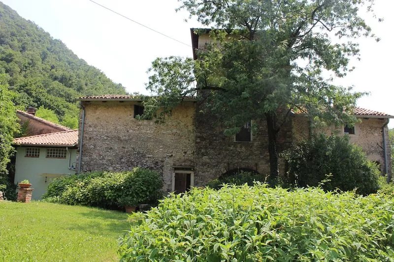 House on three floors in a medieval court in Verona