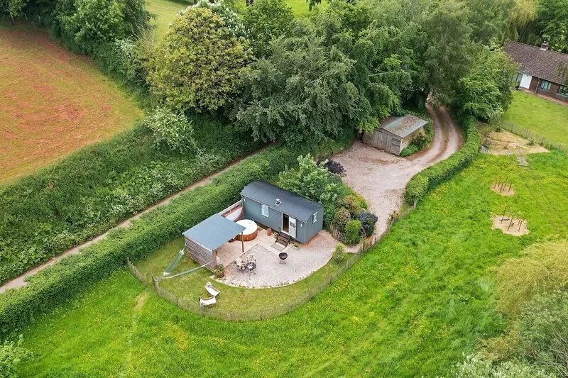 A shepherds hut that sleeps 2 guests  in 1 bedroom