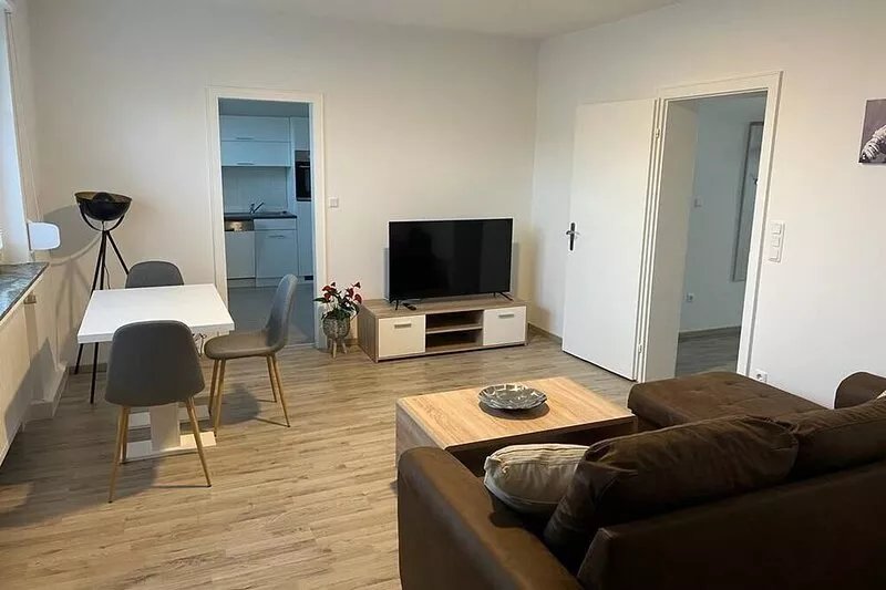 A modern renovated apartment with balcony terrace.